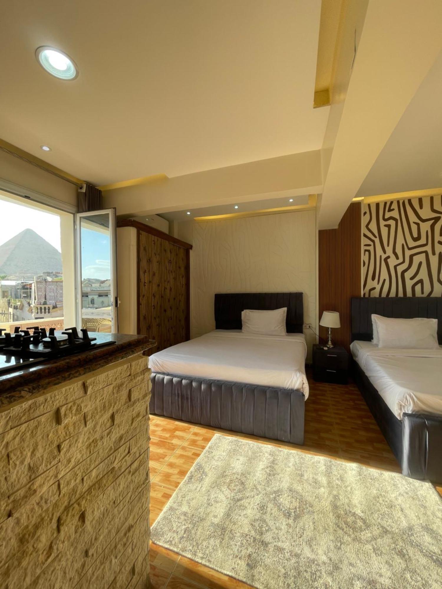 Cheops Pyramids Inn Kafrat al Jabal Bagian luar foto
